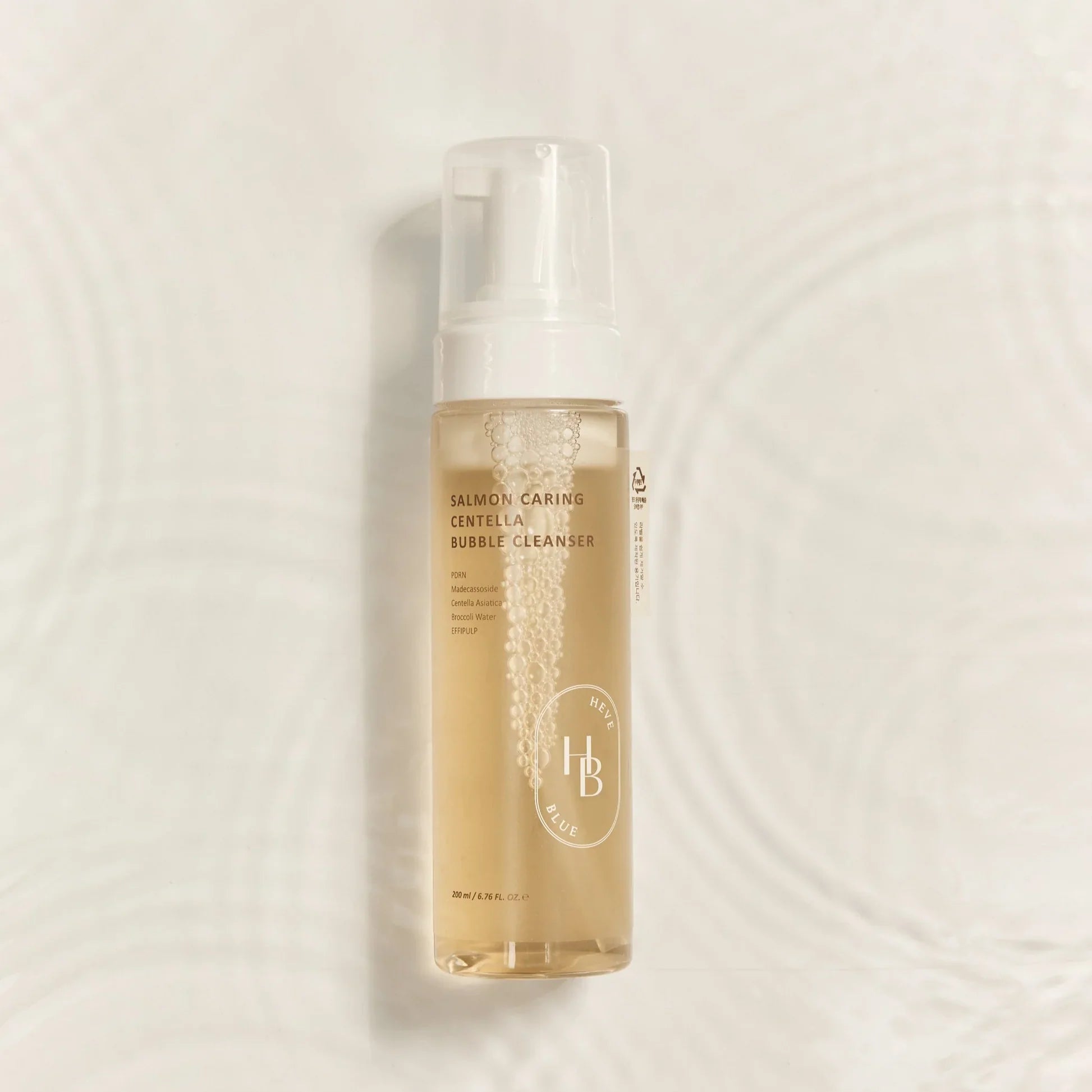 Limpiador Salmon Caring Centella Bubble Cleanser Heveblue Imagen principal del producto